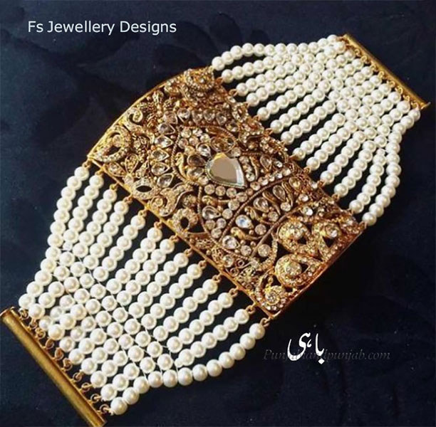  ,ਬਾਹੀ,baahi,bahi,bahin, چوڑا, chura, choora, ਚੂਡ਼ਾ,baaheeN, ਬੈਨ,bain,, Traditional Ornaments of Punjab,jewelery,jewellery,گہنا۔ بُھوکھن۔ النکار۔ٹُوم، ٹومب۔ ٹونب چھلاJewellery,jewelry,زیور ,